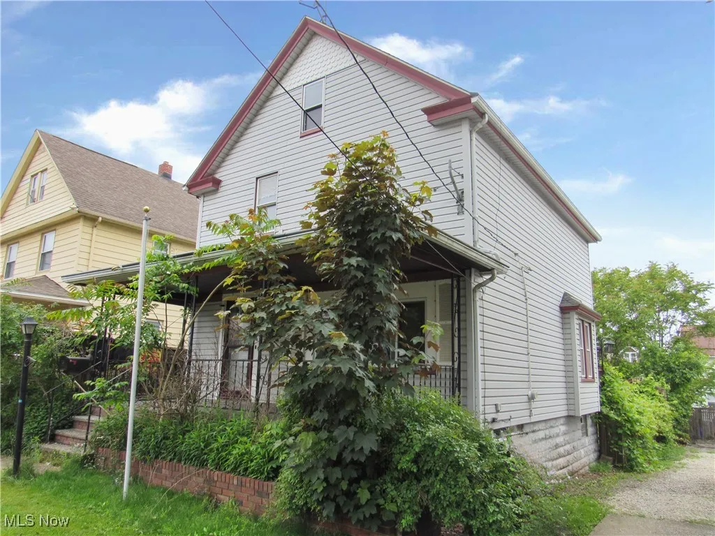 View of home's exterior featuring covered porch