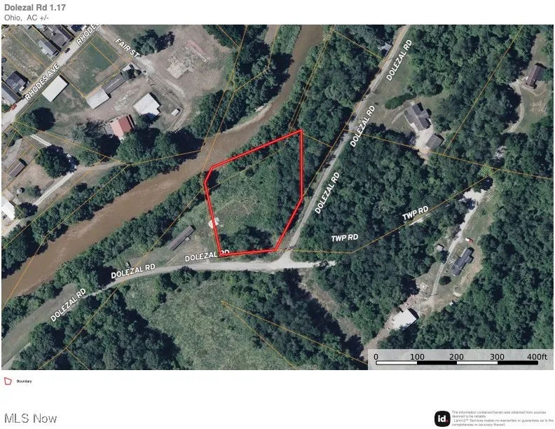 Aerial overview of property's location featuring property parcel outlined