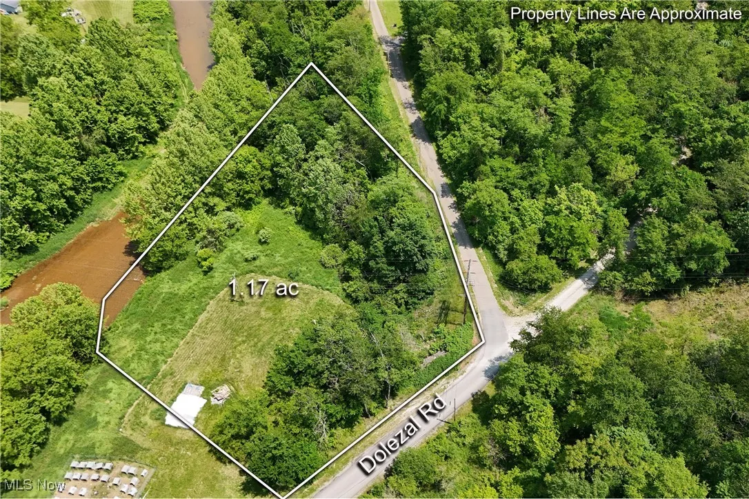 Aerial overview of property's location with property parcel outlined
