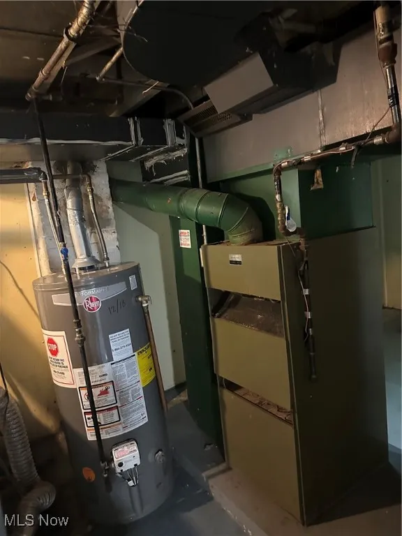 Utilities featuring water heater and heating unit