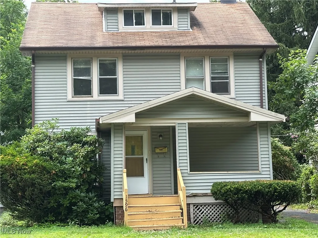 Traditional style home with a porch