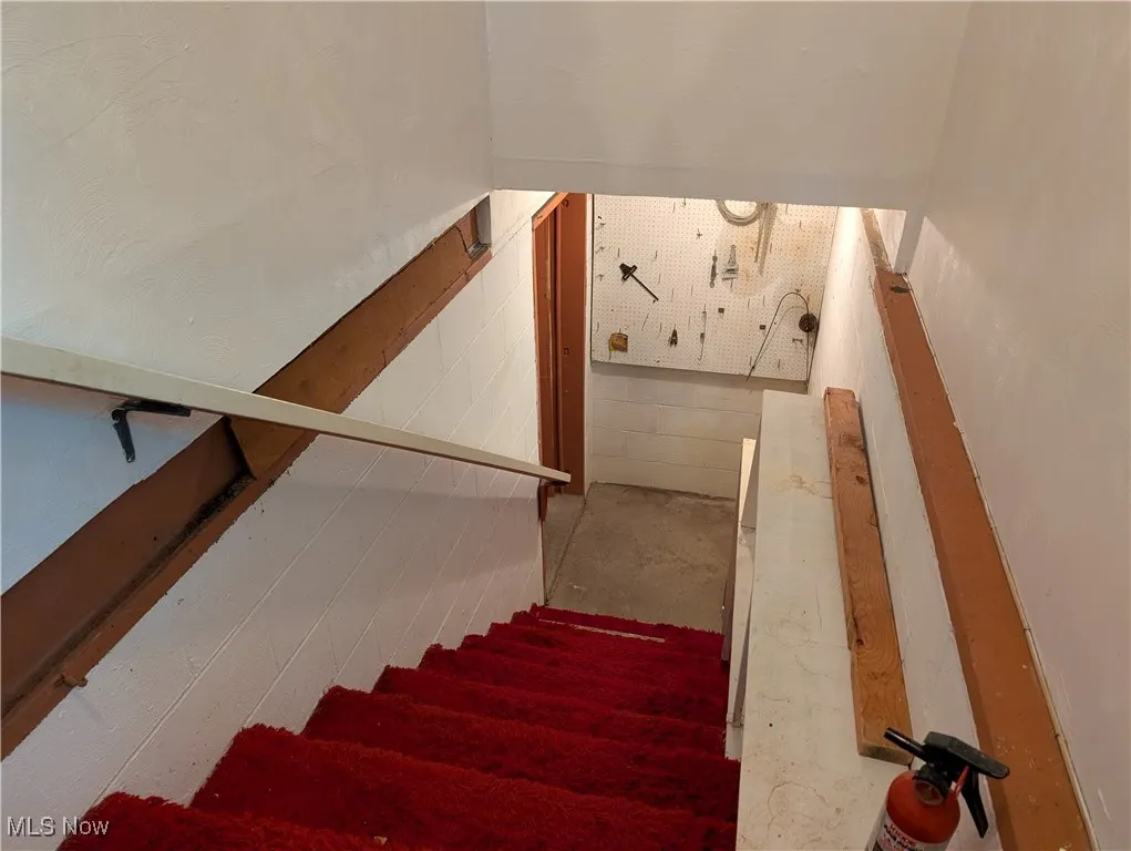 Stairs with unfinished concrete floors