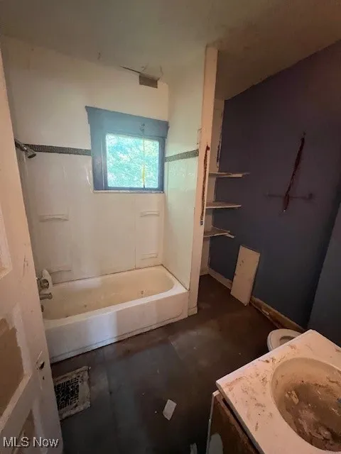 Full bathroom featuring  shower combination and vanity