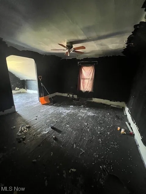 Empty room with a ceiling fan