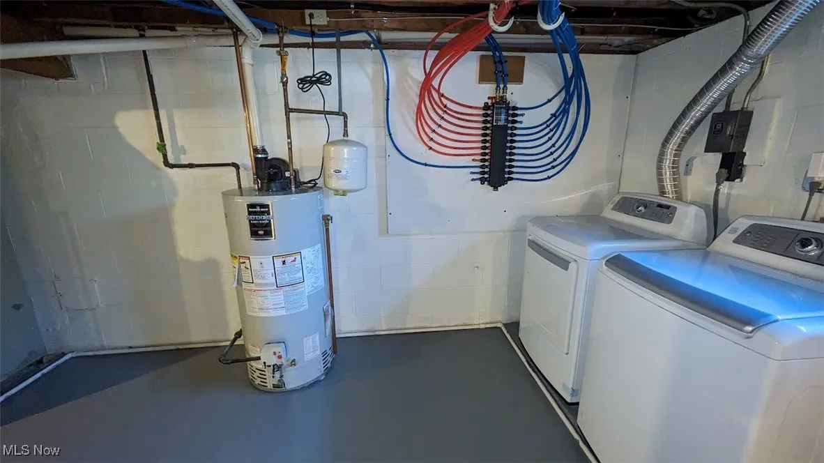 Washroom with independent washer and dryer and gas water heater