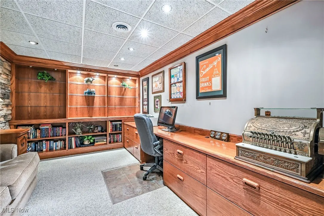 Office with recessed lighting, crown molding, and carpet