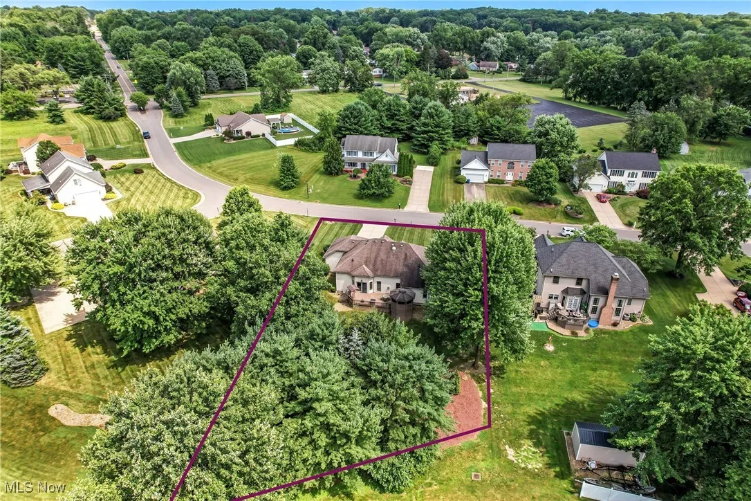 Aerial perspective of suburban area with property boundaries highlighted