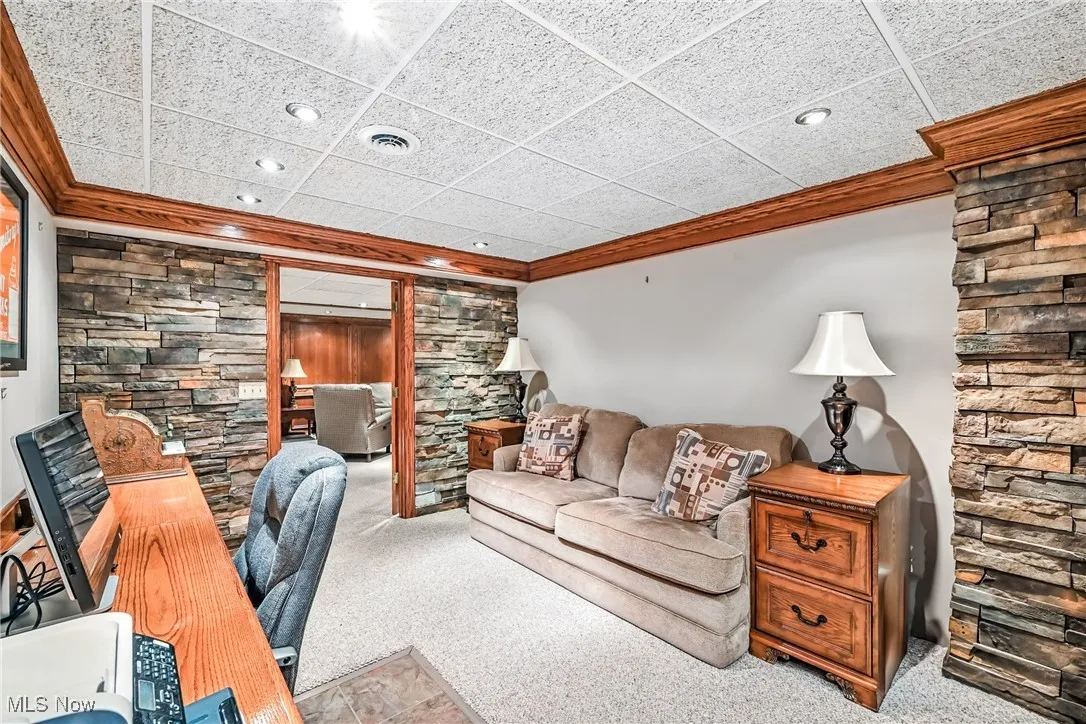Office space with crown molding, carpet flooring, and recessed lighting