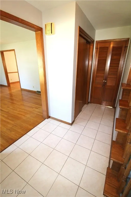 Foyer with double closet.