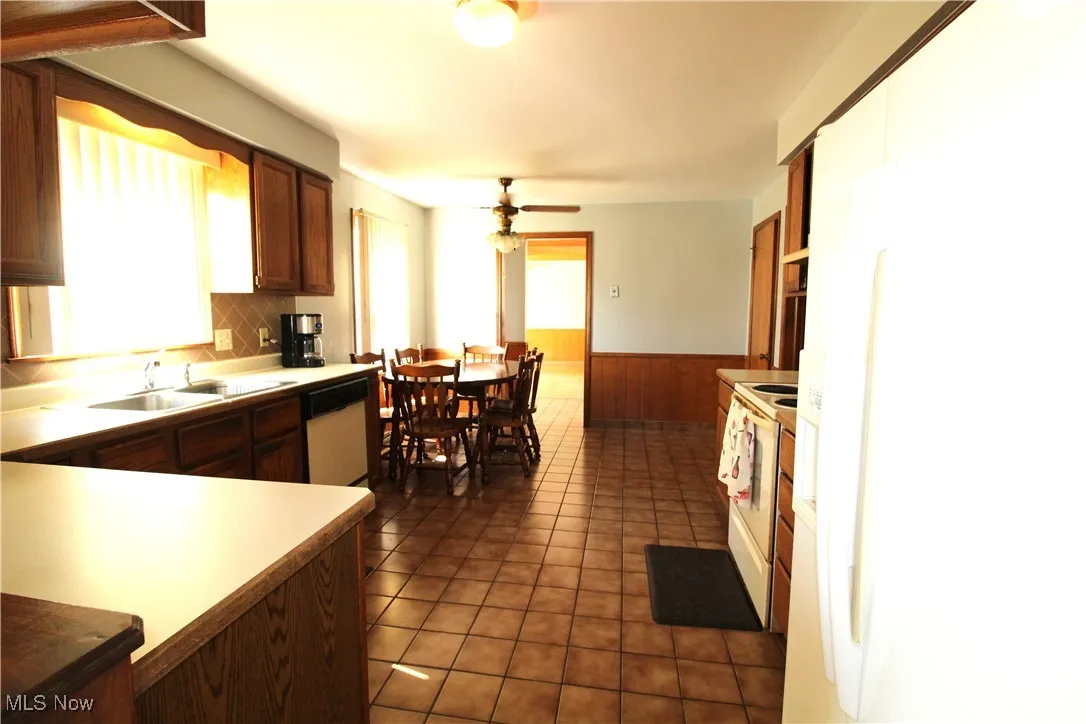 Dining room leads to Eat in Kitchen.