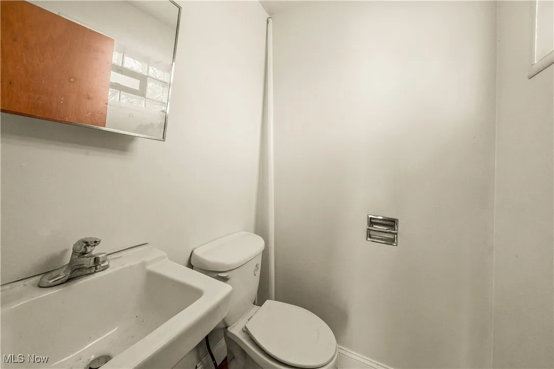Bathroom with toilet and a sink