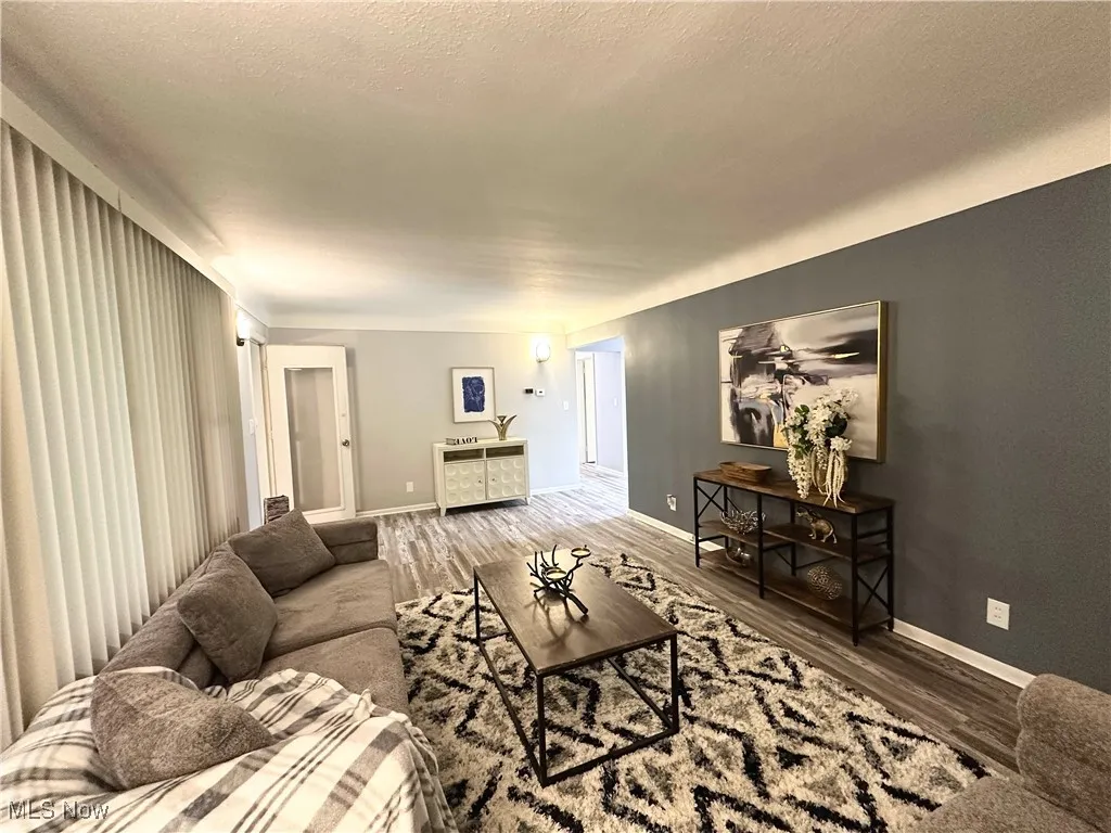 Living area with wood finished floors