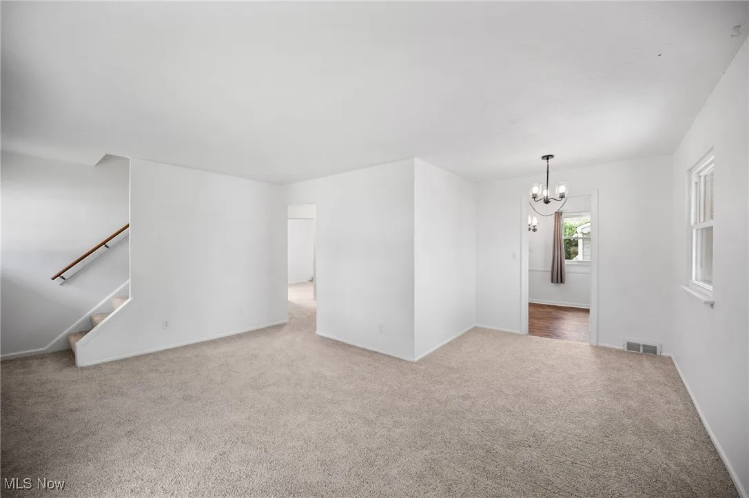 Living room featuring carpet floors