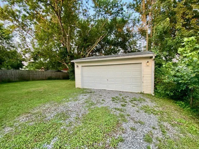 fenced in garage backyard