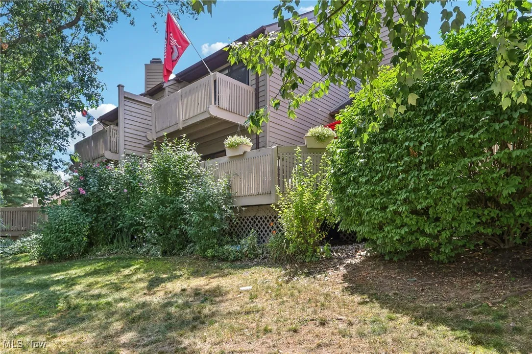 Back view of the condo showing balcony and deck