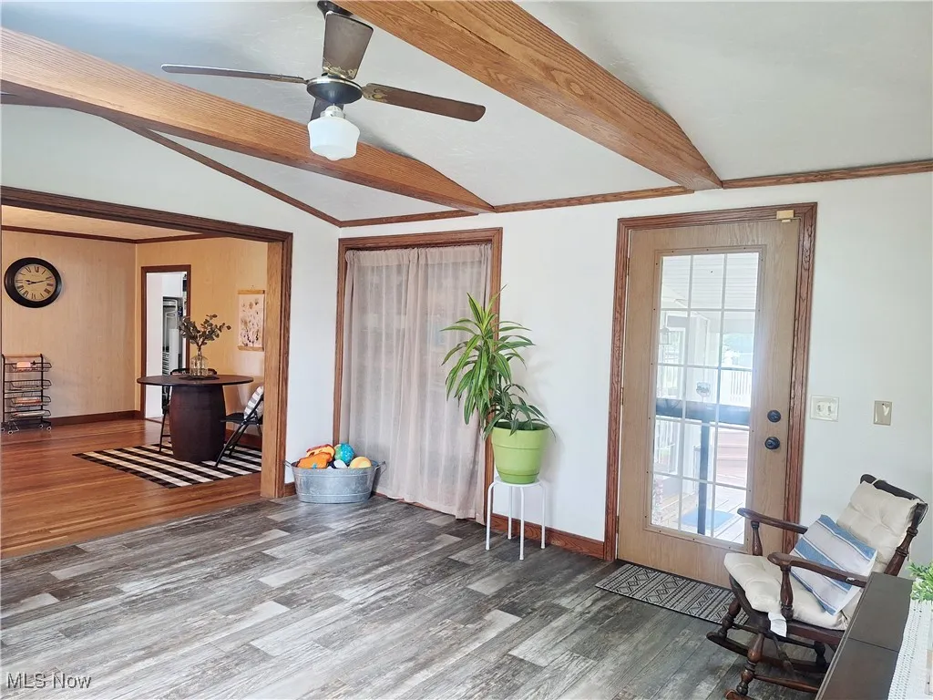 with built in bookshelves behind curtains
