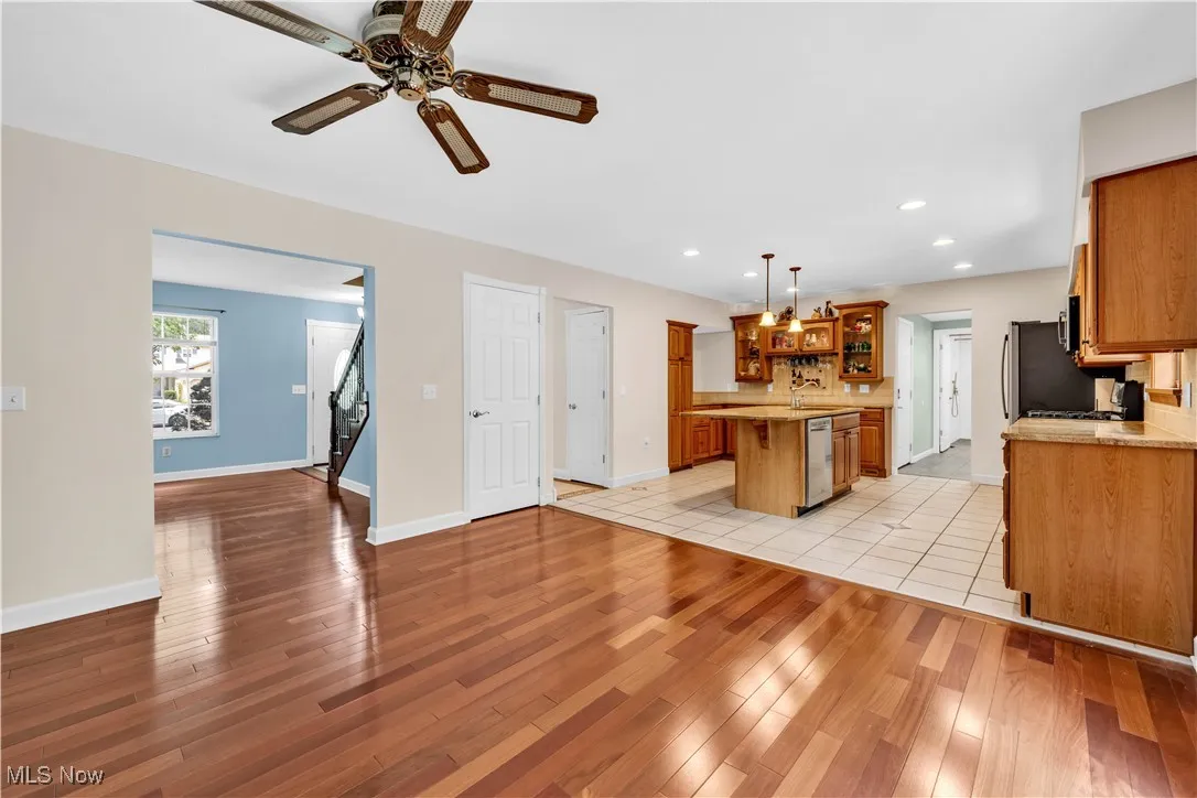FAMILY ROOM OPEN AND ADJOINGING TO UPDATED CLASSIC KITCHEN