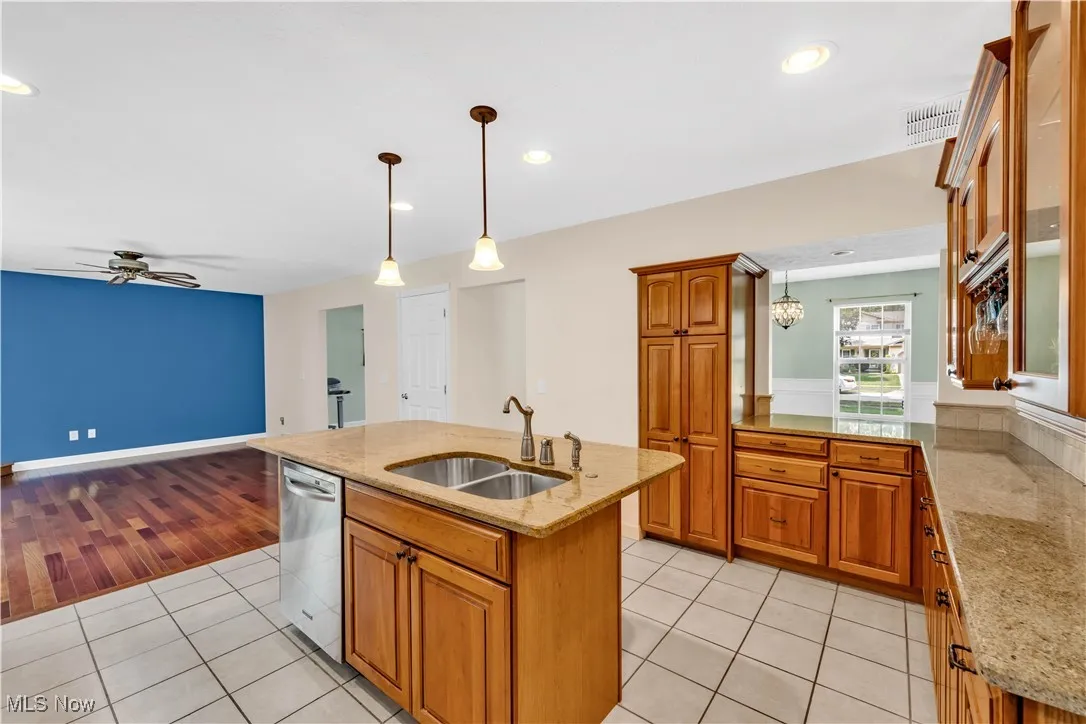KITCHEN ALSO FEATURES RECESSED LIGHTING