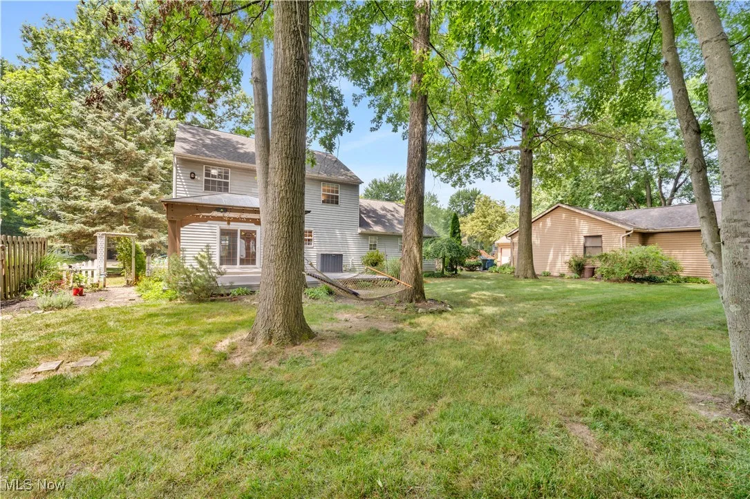 SPACIOUS AND WOODED BACKYARD