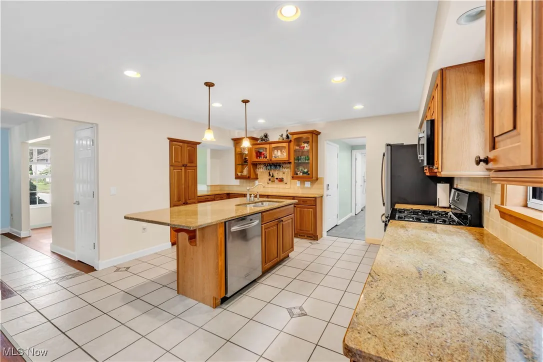 KITCHEN - ACCESS TO FIRST FLOOR SPACIOUS FULL BATHROOM AND LAUNDRY ROOM