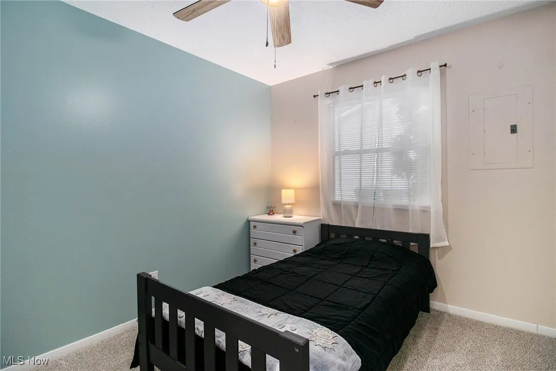 Bedroom with carpet.