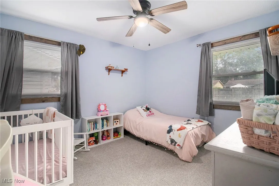 Bedroom featuring carpet flooring.