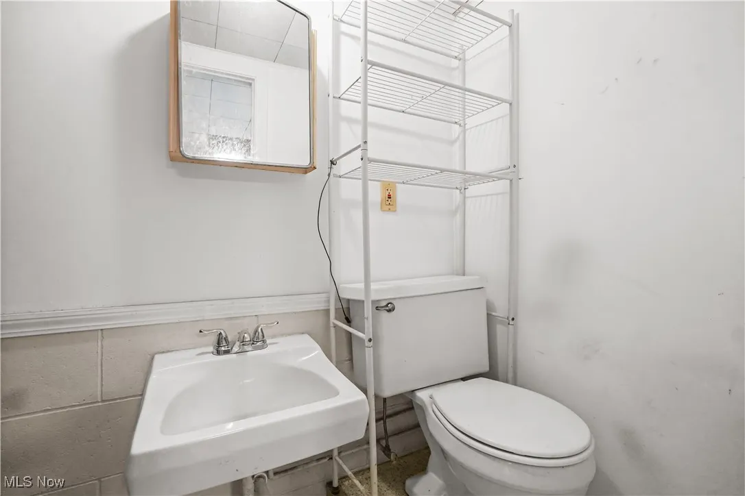 Bathroom with toilet and a sink