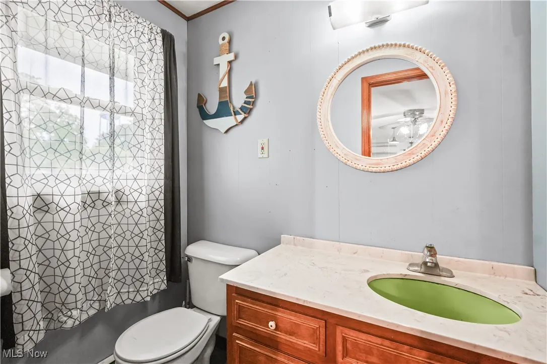 Full bathroom featuring vanity and tub / shower combination