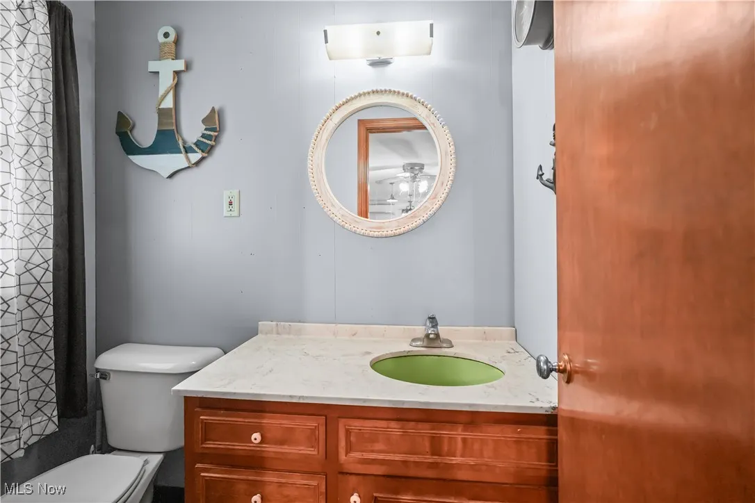 Bathroom featuring toilet and vanity