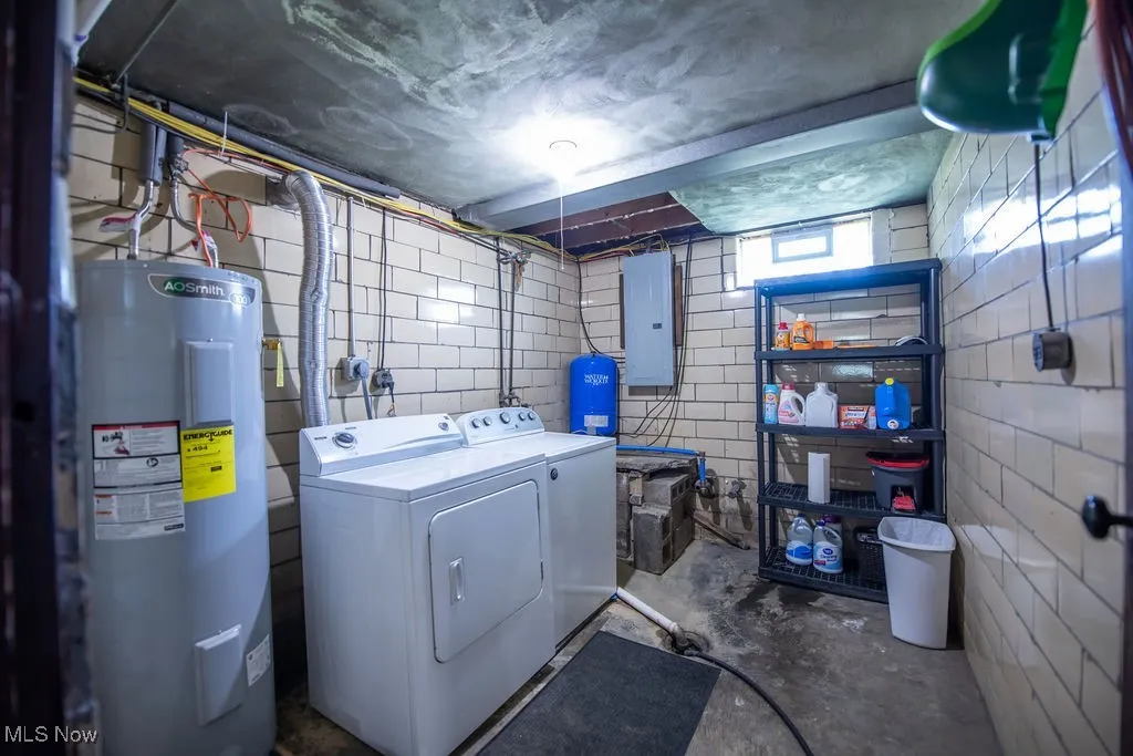View of laundry room area in basement