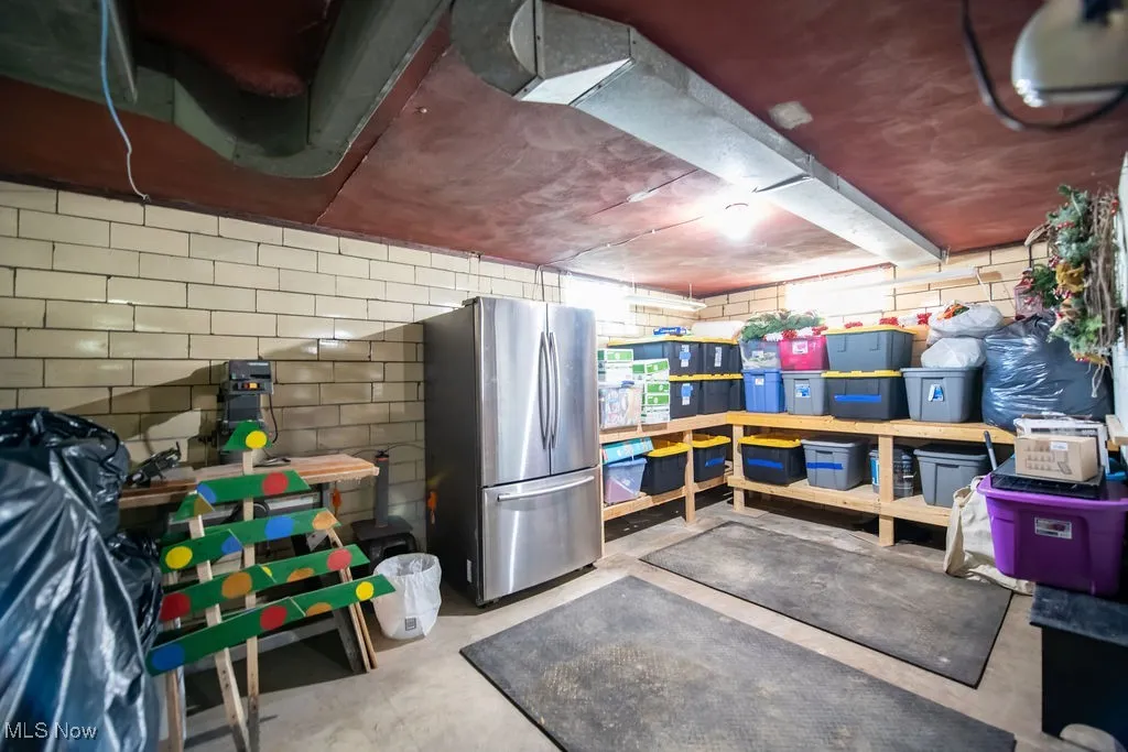 View of basement area with storage