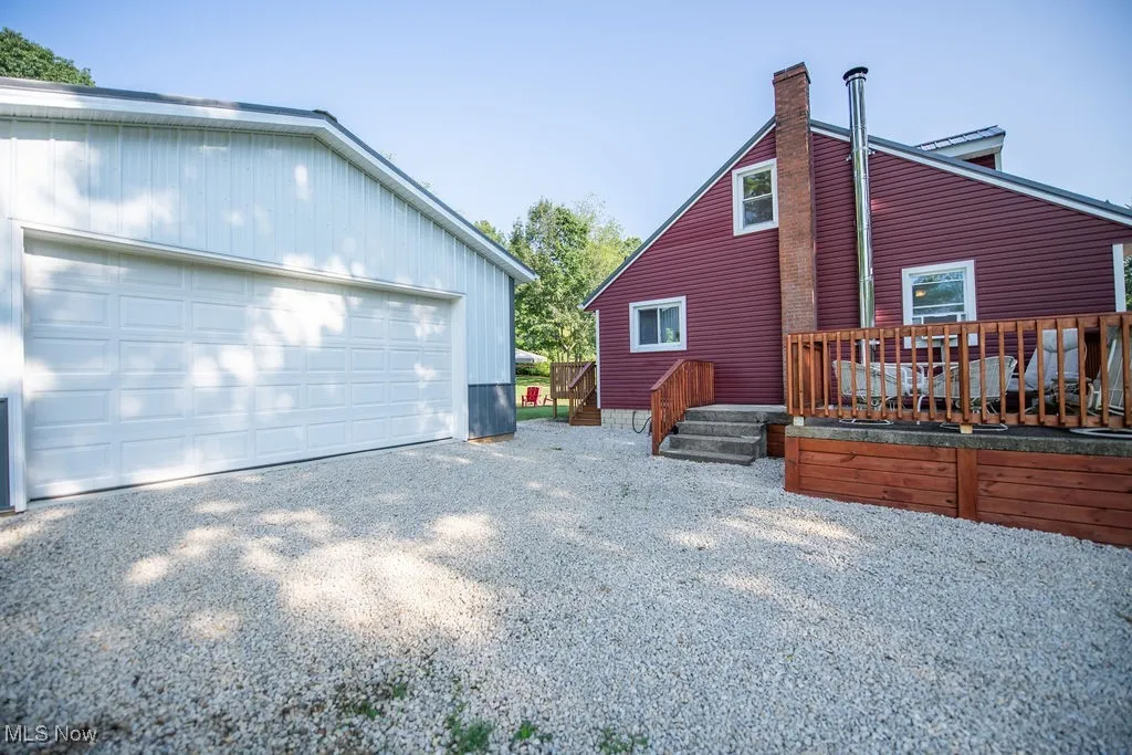 View of garage / side of home area