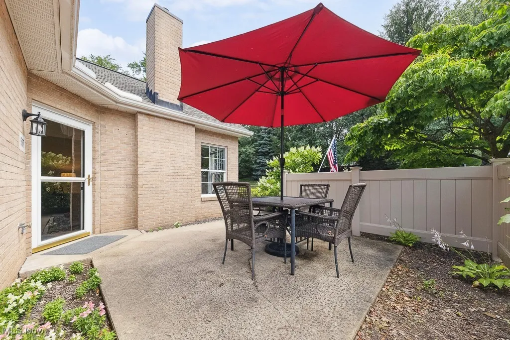 View of patio with outdoor dining area