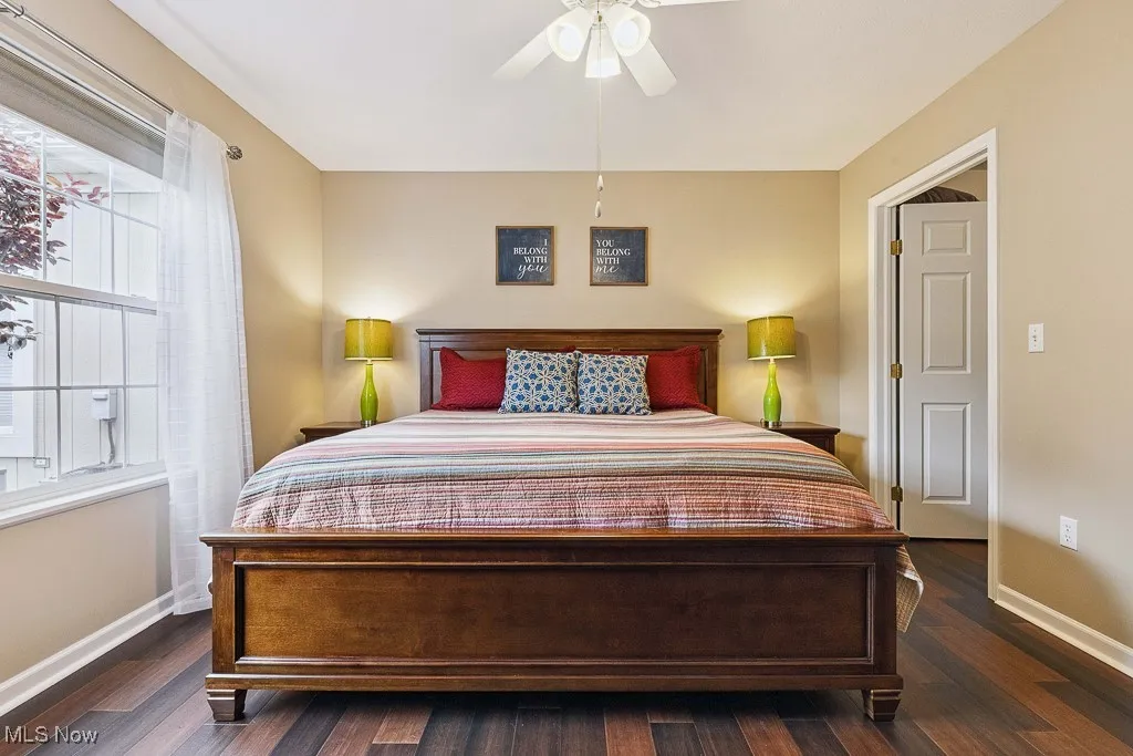 Bedroom with wood finished floors and a ceiling fan