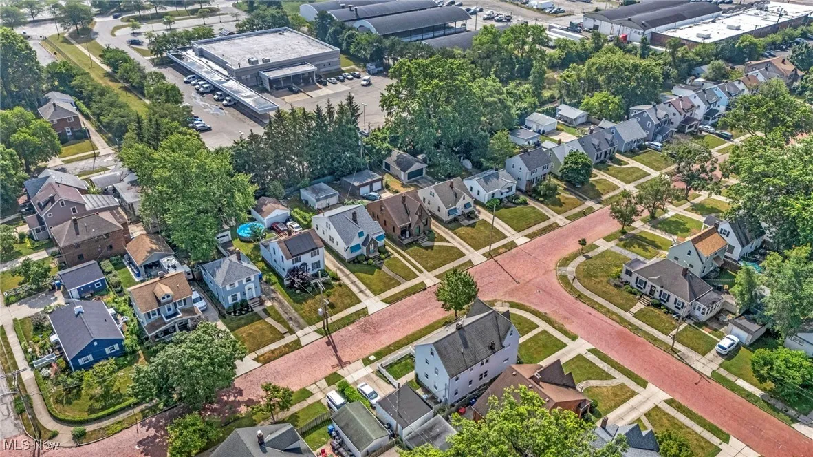 Aerial overview of property's location with nearby suburban area