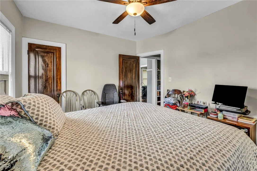 Bedroom featuring ceiling fan