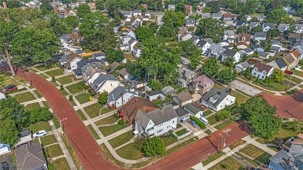 Aerial overview of property's location featuring nearby suburban area