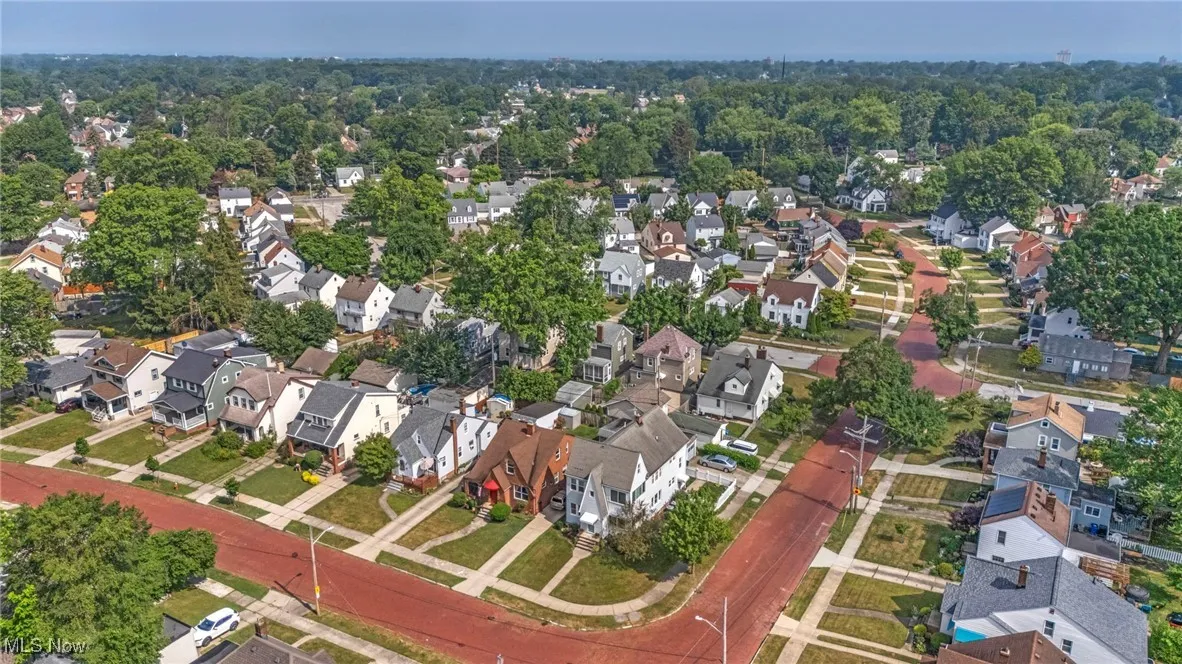 View of property location with nearby suburban area