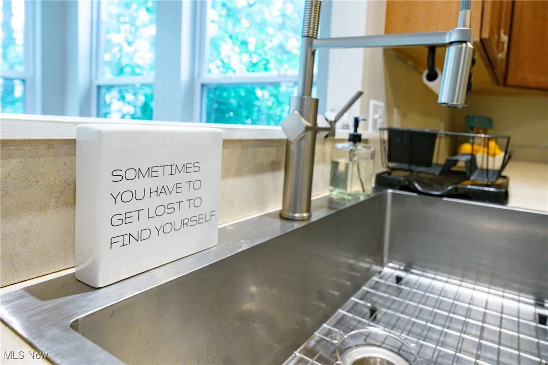 Kitchen view of brown cabinetry