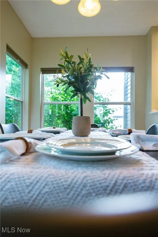 Bedroom featuring multiple windows