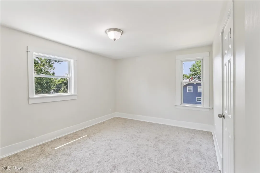 Bedroom with carpet flooring