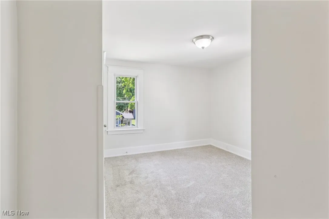 Bedroom with carpet flooring