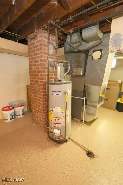 Utilities featuring gas water heater and heating unit