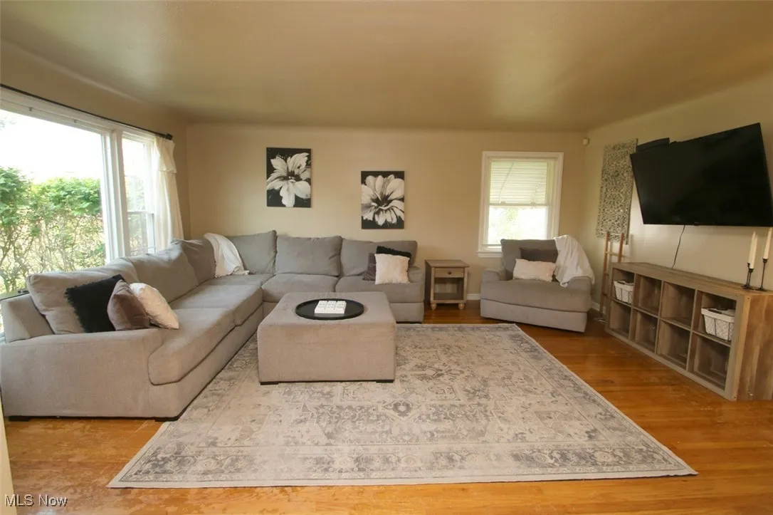 Living area featuring wood finished floors