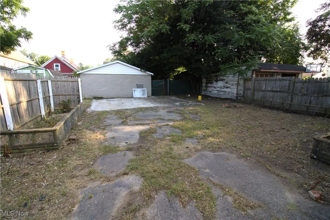 View of fenced backyard