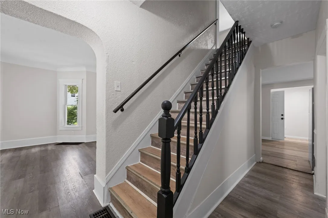 Stairway with wood style floors