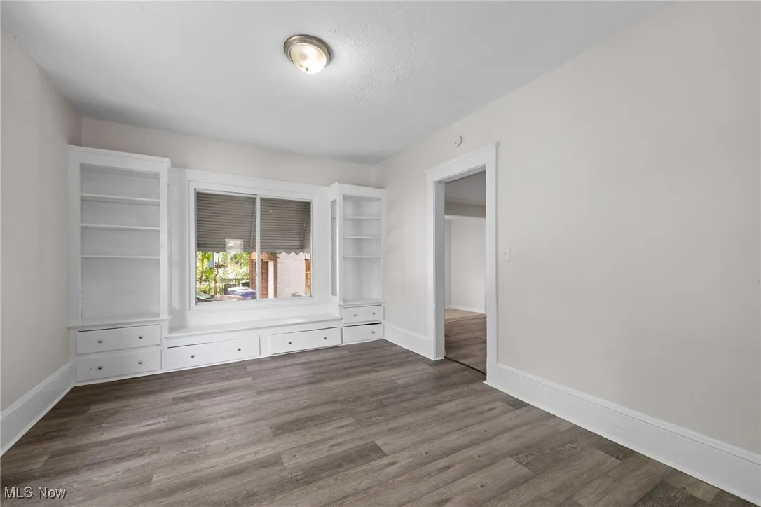 Dining room featuring baseboards and wood style floors