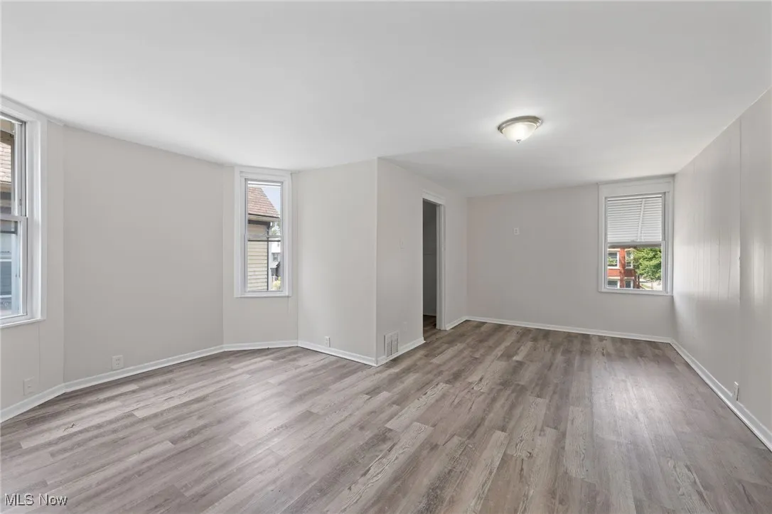 Bedroom featuring wood style floors