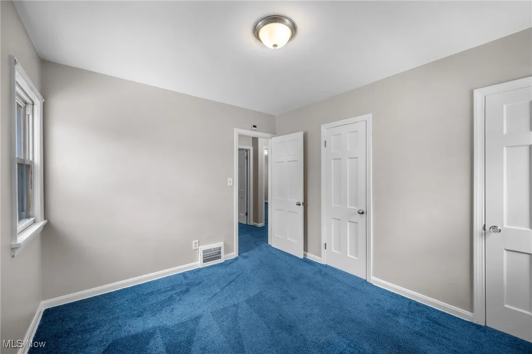 Bedroom with carpet floors