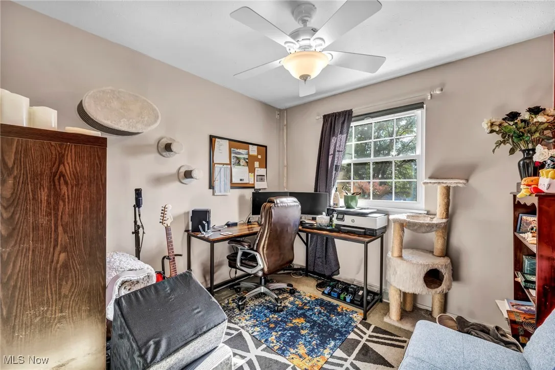 Office space featuring ceiling fan